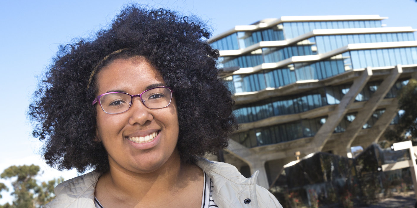 Person and Geisel Library in background